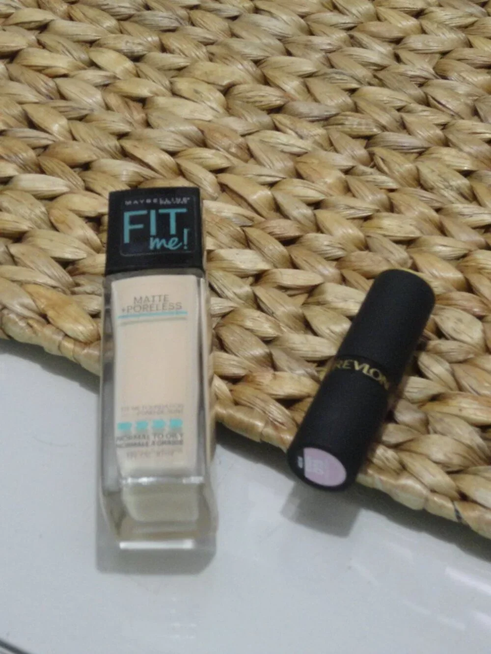 Maybelline Fit Me Matte + Poreless Foundation and Revlon lipstick.